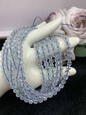 Aquamarine glass-clear body, three-wrap 6mm.
