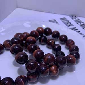 Large size red tiger's eye (16mm), each with lightning pattern.