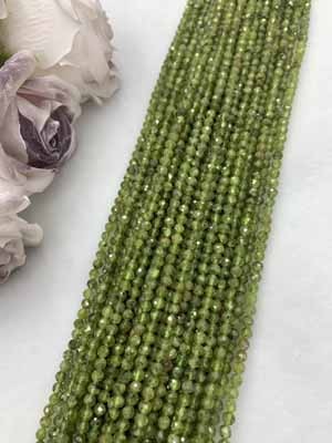 Peridot small faceted 4mm, long chain 38cm.