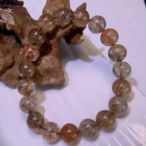 Semi-transparent Black Gold Super (10mm) single-strand bracelet