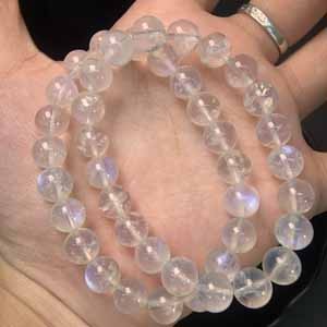 Clear Blue Moonstone with a little symbiotic inclusion (9mm) Single Strand Bracelet