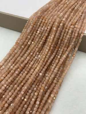 Orange moonstone sugar cube 3x3mm, long chain 38cm.