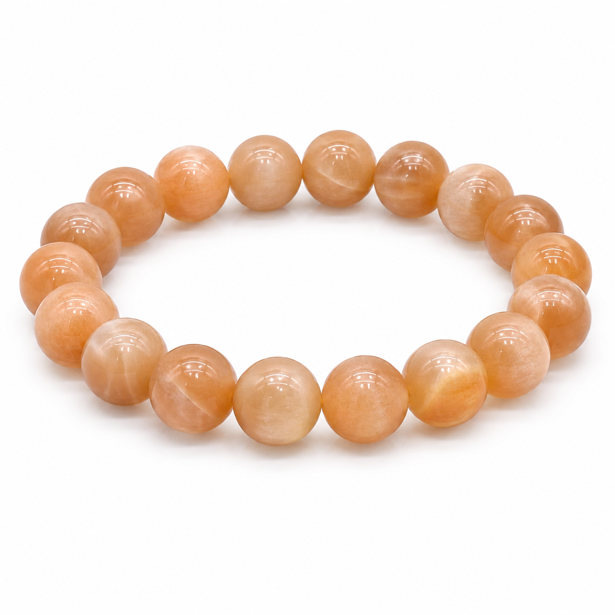 Orange moonstone 10-14mm bracelet. Makes bad luck detour and the night path bright.