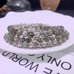 Tourmaline green hair multi-wrap (6+mm) three-wrap wrist.