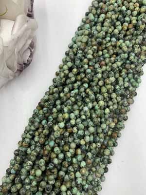 African turquoise teardrop 6mm, long chain 38cm.