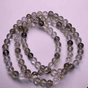 Tourmaline & Green Rutilated Quartz Multi-Strand (6+mm) – Layered as a 3-loop bracelet for wrist wear.