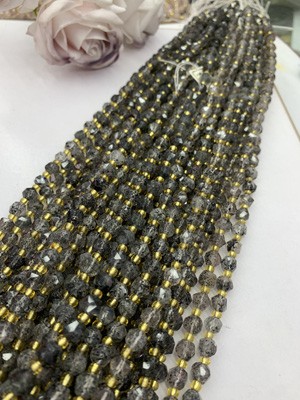 Black Super Seven formless beads (each approx. 7-8mm), long chain 38cm.