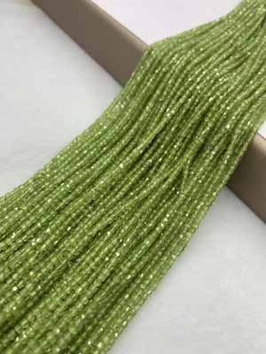 Peridot sugar cube 2x2mm, long chain 38cm.